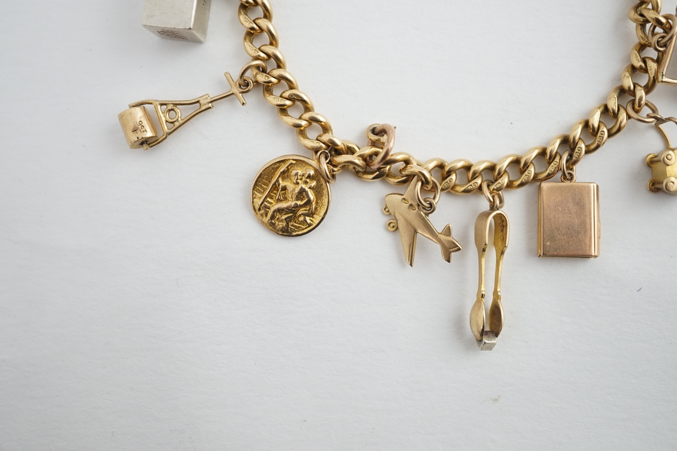 A 18ct gold charm bracelet